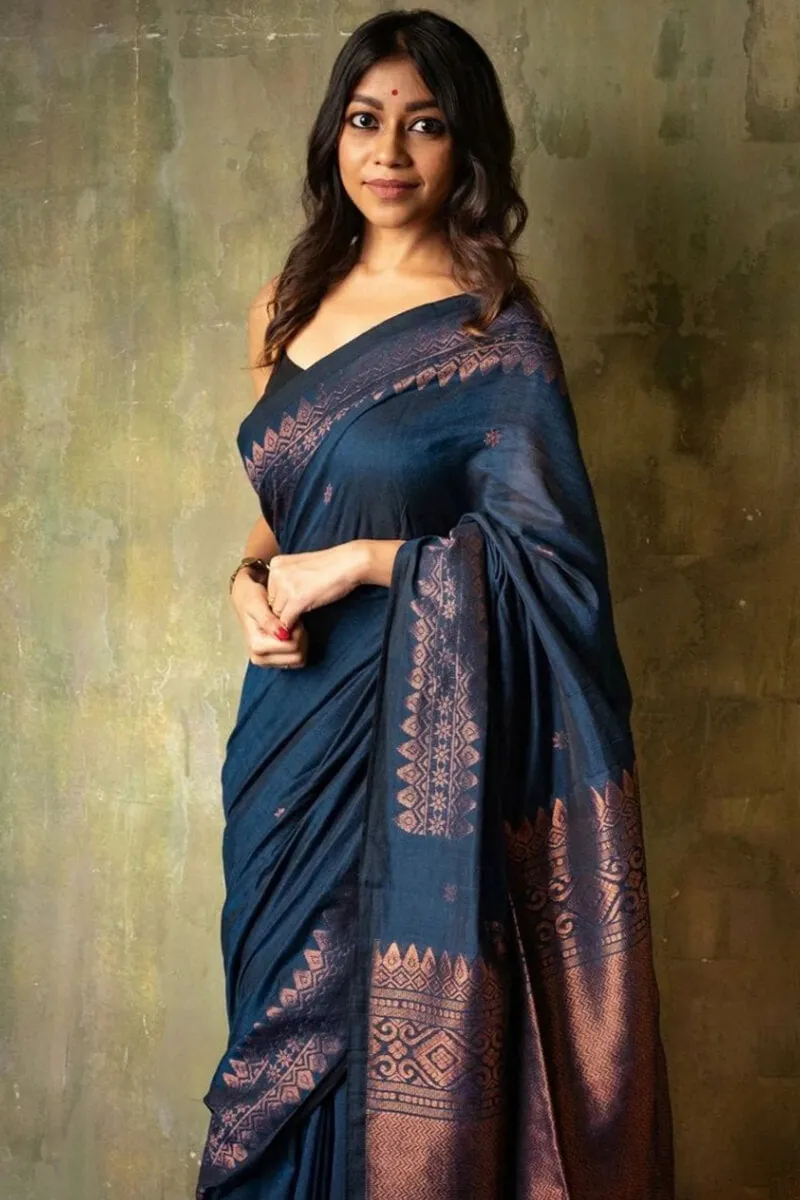 Inimitable Navy Blue Soft Silk Saree With Verdant Blouse Piece